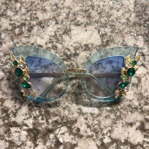 Blue costume glasses with stones